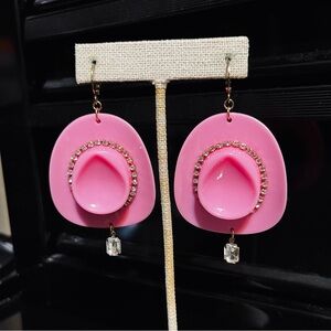 Vibrant pink earrings with rhinestones